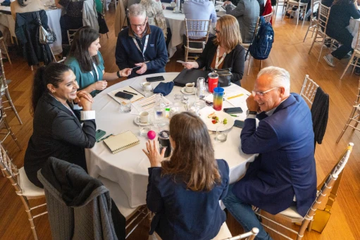 MSDO conference delegates at a session table